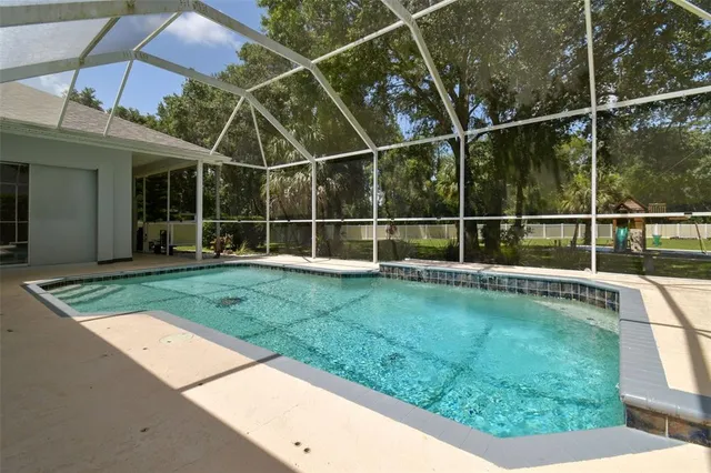 $799,999 | 1460 Kensington Woods Drive, Lutz, FL 33549
