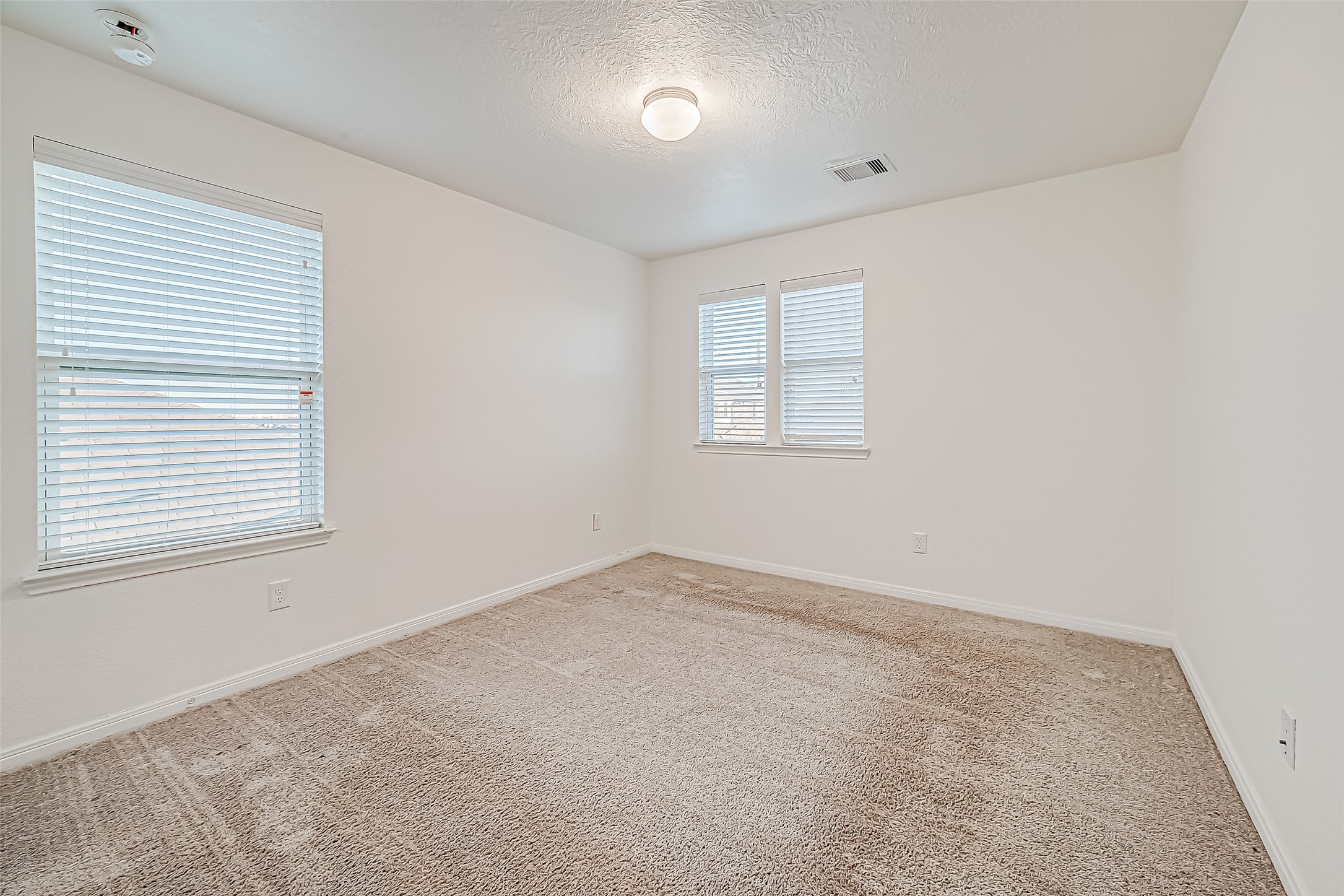 7106 Escondido Drive Rosharon, TX 77583 - Photo 22 of 41 an empty room with a window