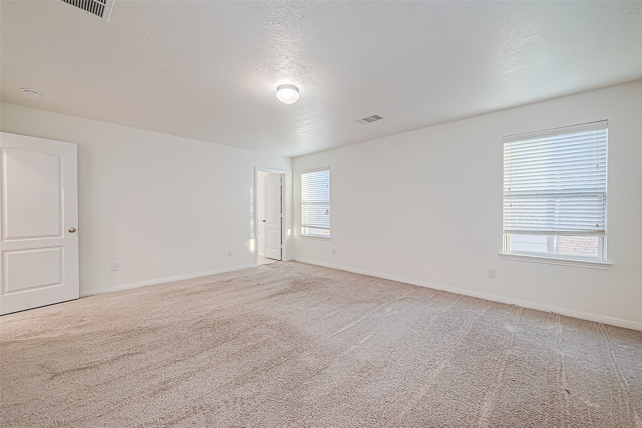 7106 Escondido Drive Rosharon, TX 77583 - Photo 30 of 41 a view of an empty room with a window