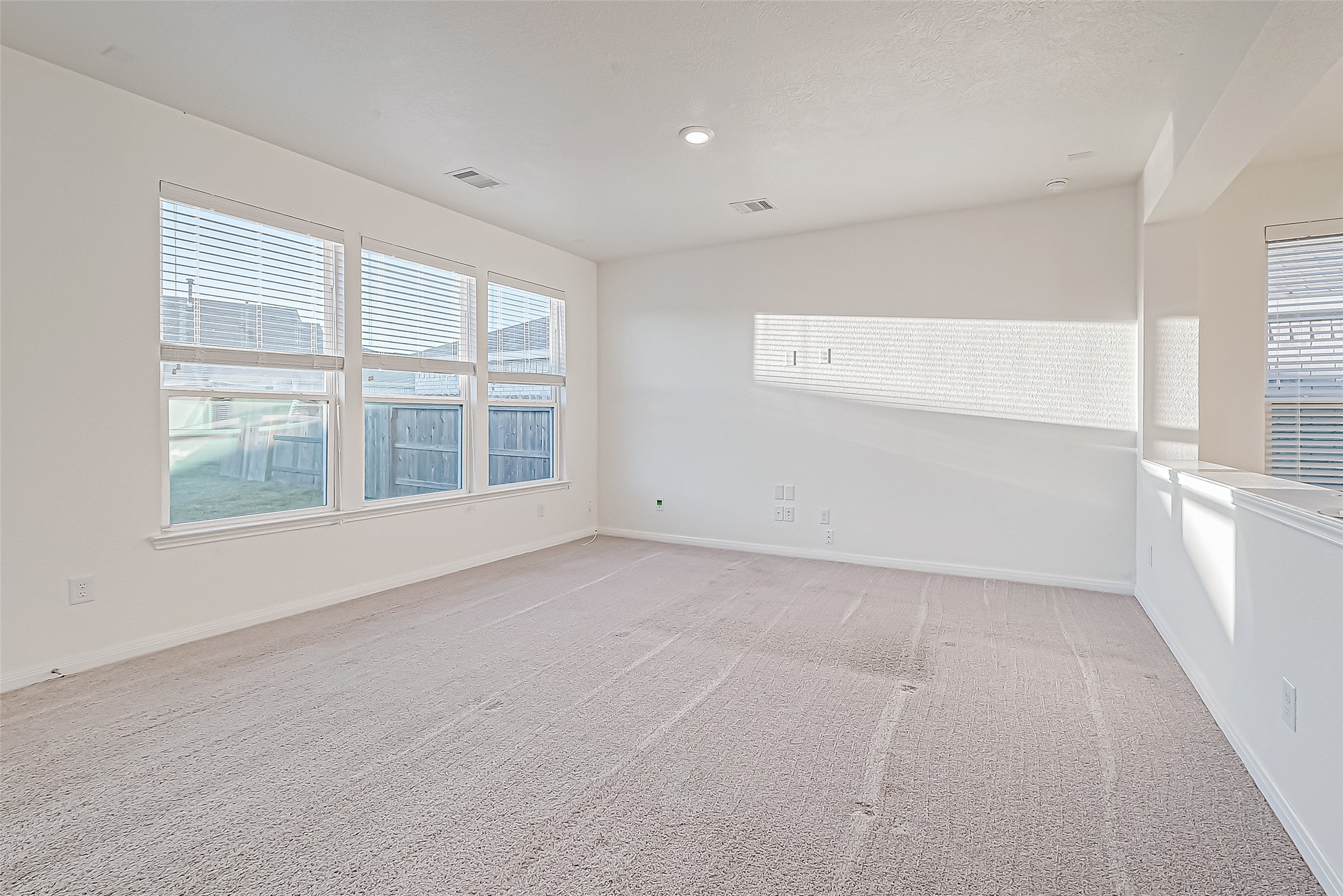 7106 Escondido Drive Rosharon, TX 77583 - Photo 6 of 41 a view of an empty room with a window