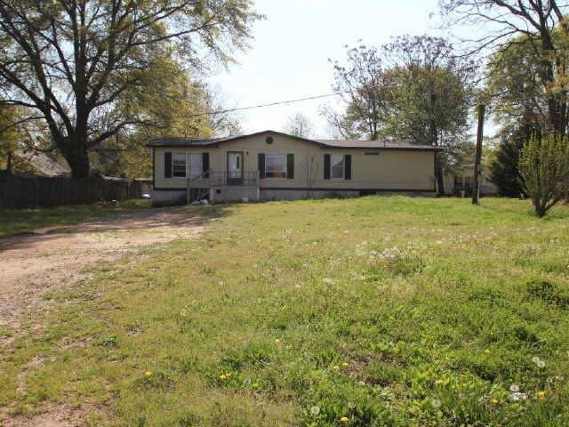 39 Old Mill Road Crawford, GA 30630 - Photo 1 of 1 a front view of house with yard and trees