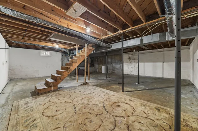 a very nice looking living room with a large window