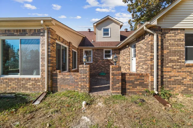 a view of a lake with a yard