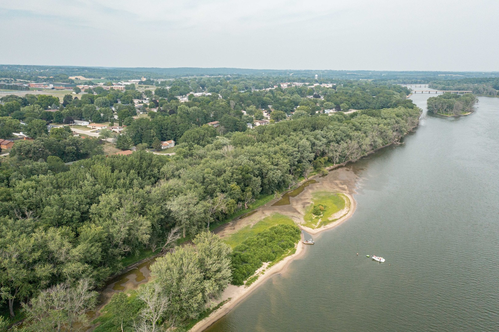 0 River Drive Byron, IL 61010 - Photo 18 of 33 an aerial view of green landscape with trees houses and mountain view