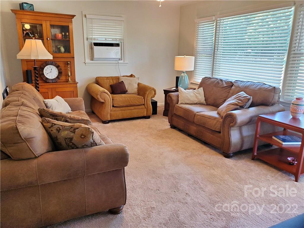 4681 Emerald Drive Morganton, NC 28655 - Photo 18 of 38 a living room with furniture and a window