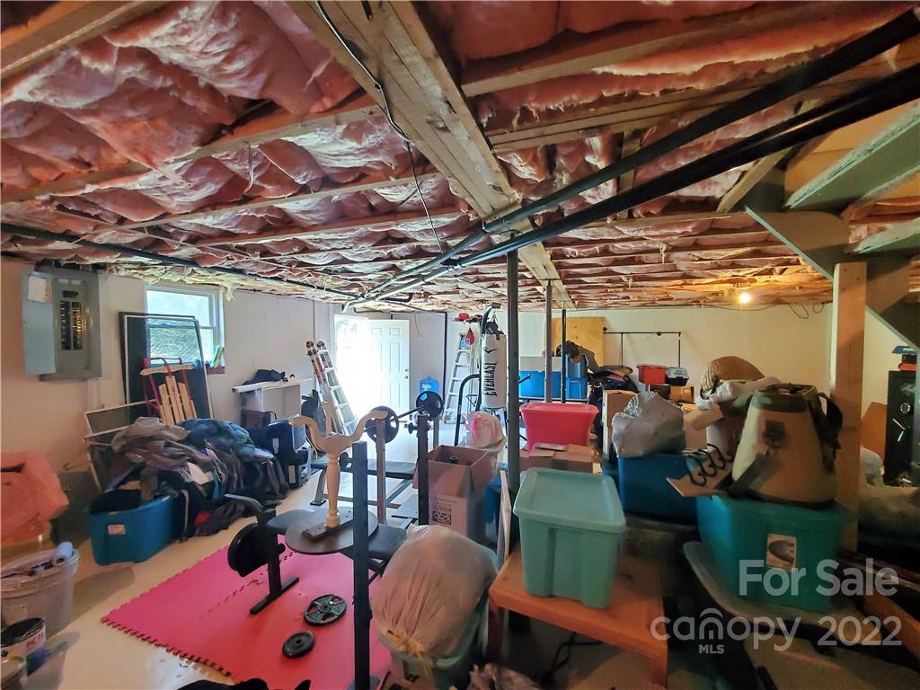 4681 Emerald Drive Morganton, NC 28655 - Photo 36 of 38 a room with lots of furniture and mountain view