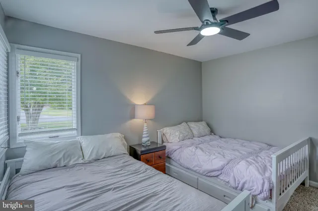 an aerial view of a house with a big yard