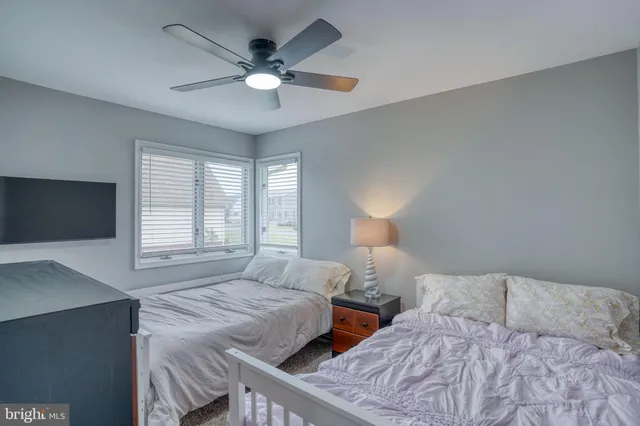 an aerial view of a house with garden space and lake view