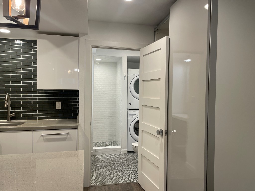 2220 Leon Street, Unit 103 Austin, TX 78705 - Photo 10 of 15 a bathroom with a shower and a sink