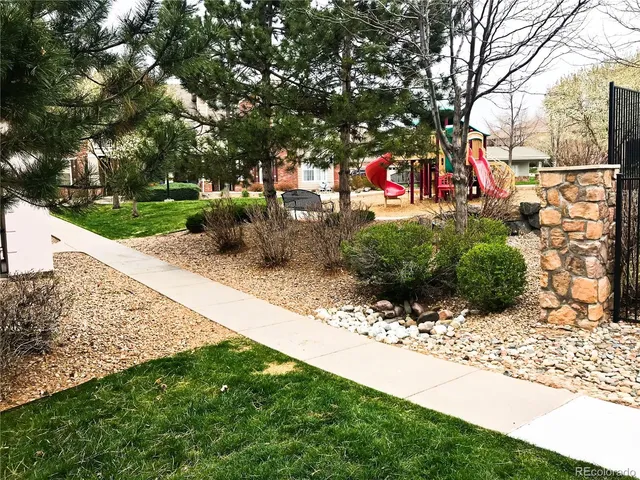 a view of a chairs and tables in patio