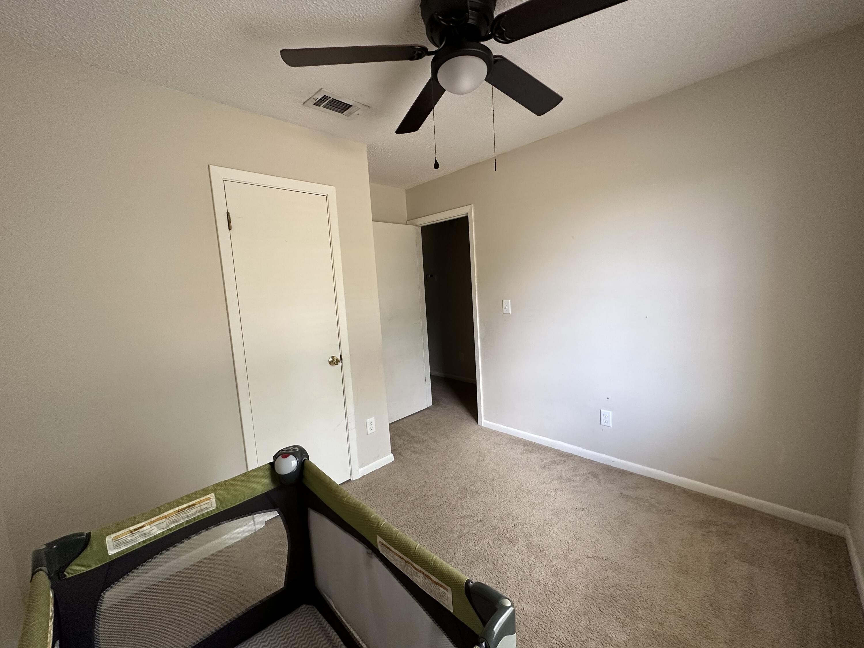 4872 Griffith Mill Road Holt, FL 32564 - Photo 10 of 15 an empty room with closet