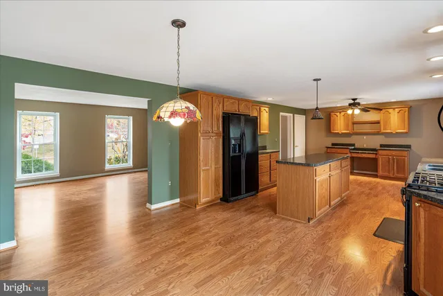 a view of a kitchen with cabinets