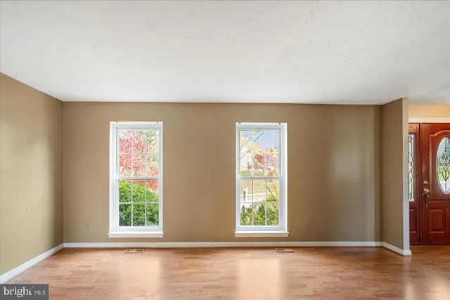 an empty room with windows