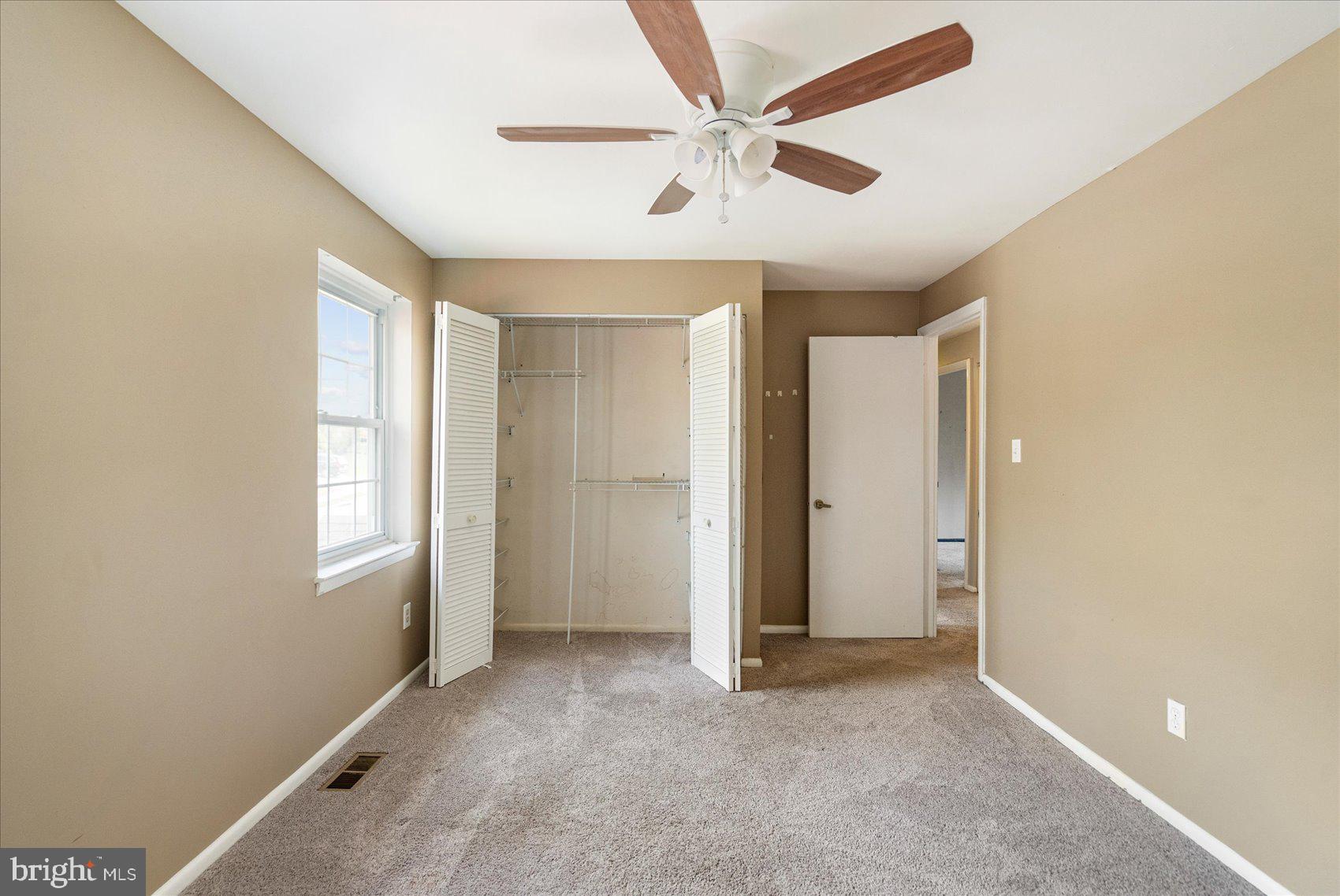 4003 Jacinth Way Baltimore, MD 21236 - Photo 27 of 43 a view of an empty room with a window