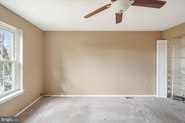 a view of a big room with closet area