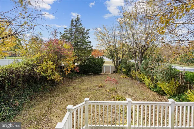 a view of balcony with wooden floor