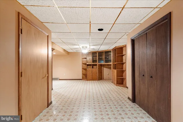 a view of a room with windows