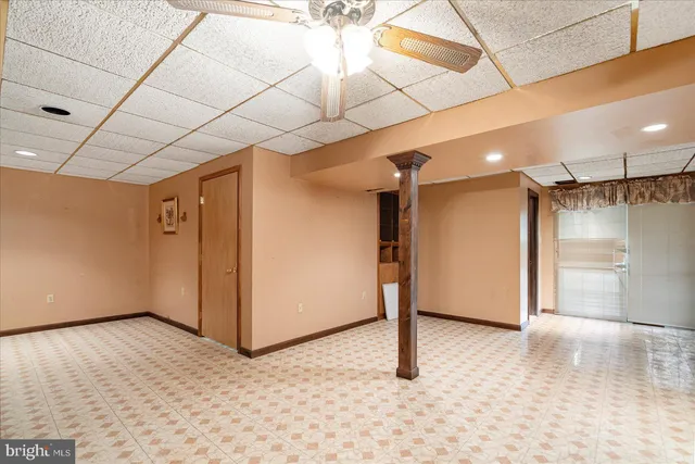 a view of a hallway with a room