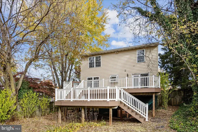 a front view of a house with a deck