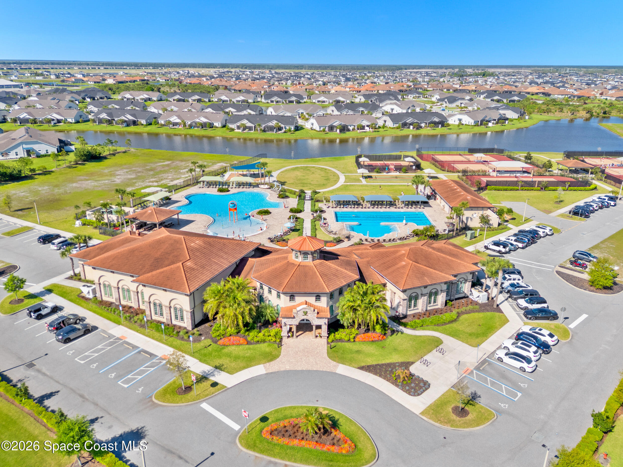 3363 Addison Drive Melbourne, FL 32940 - Photo 37 of 53 an aerial view of residential houses with outdoor space and swimming pool