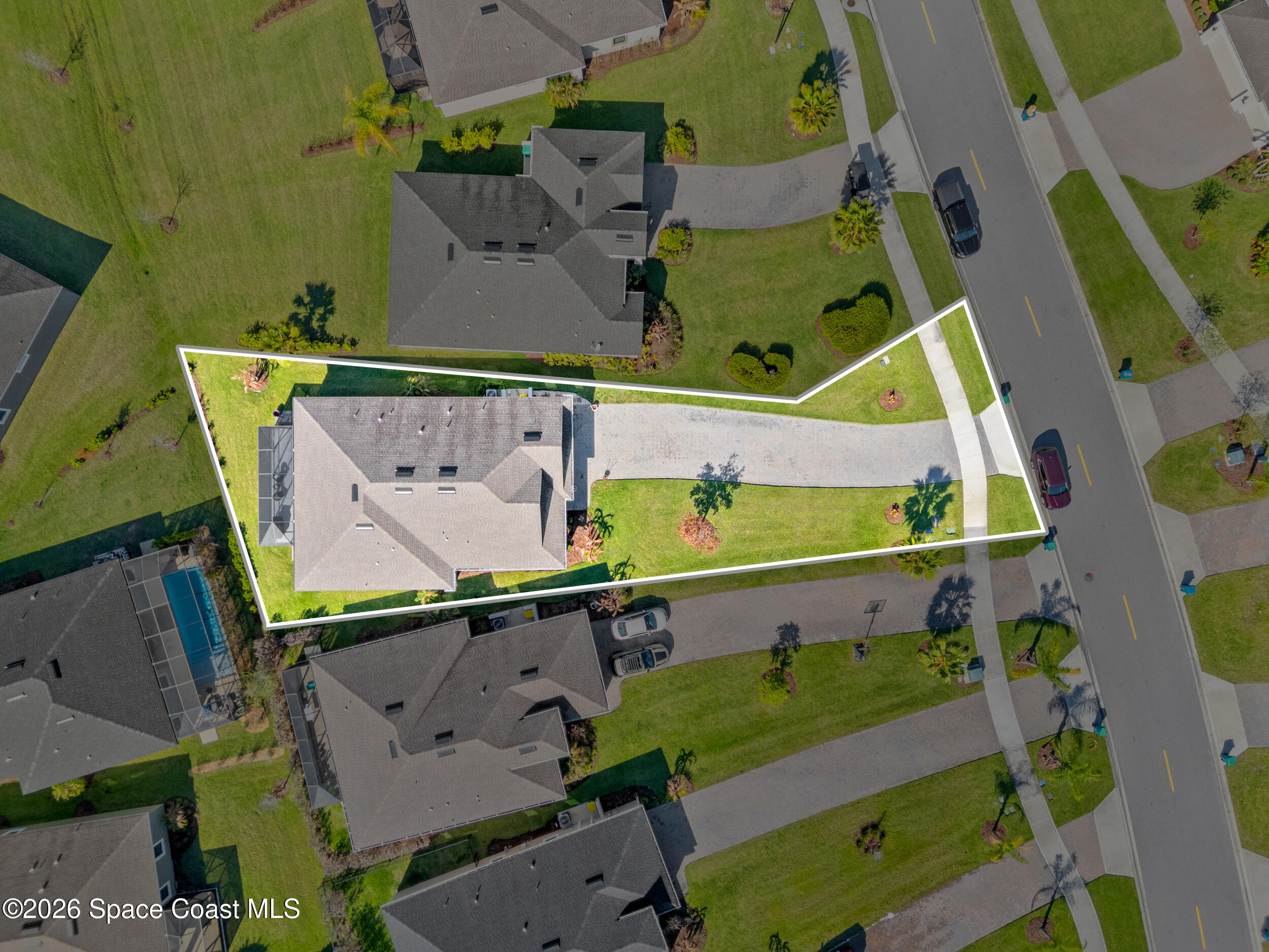 3363 Addison Drive Melbourne, FL 32940 - Photo 46 of 53 an aerial view of a houses with street