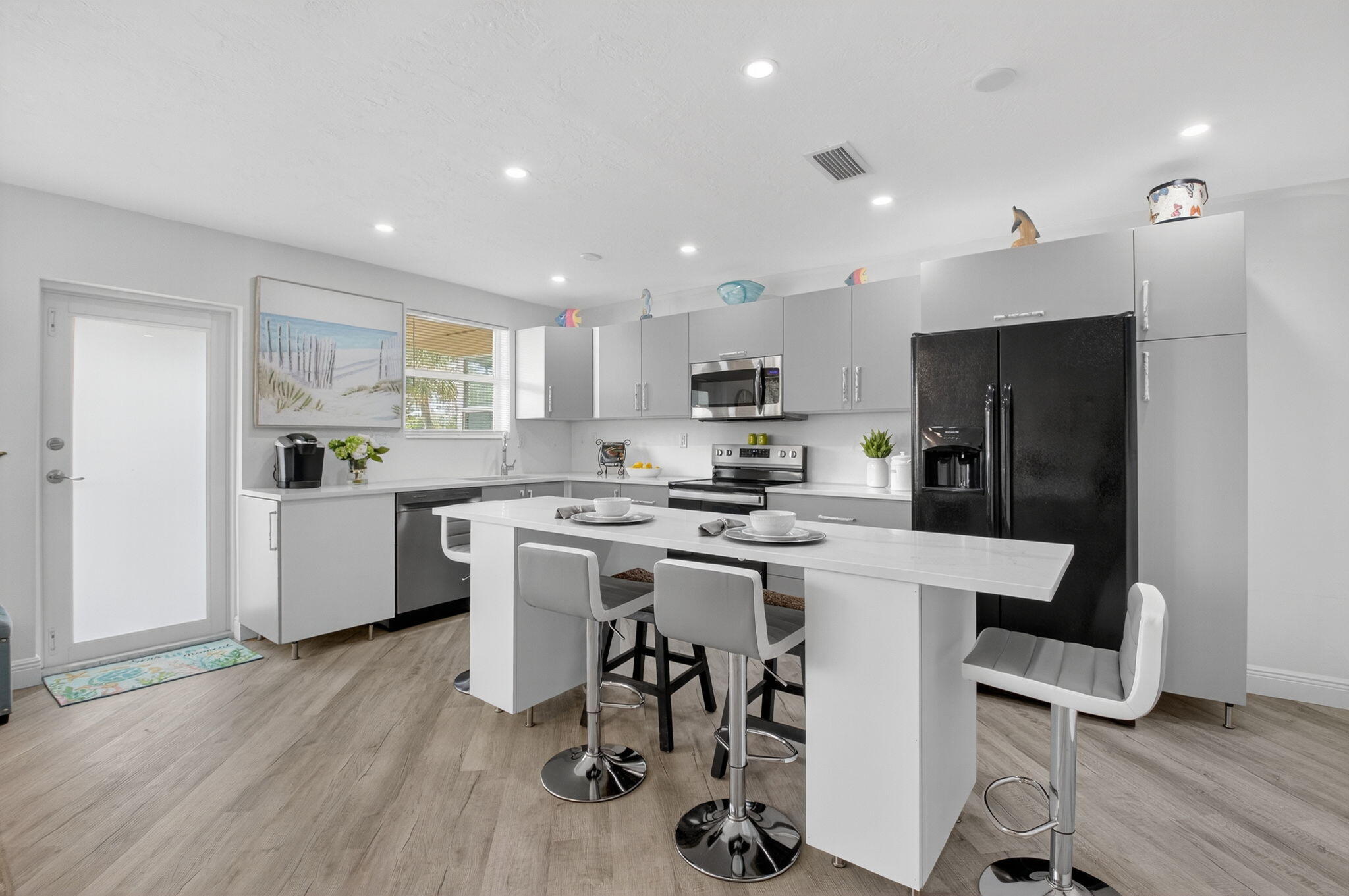 930 Osceola Drive, Unit 8 Boca Raton, FL 33432 - Photo 9 of 33 Expansive Kitchen Island