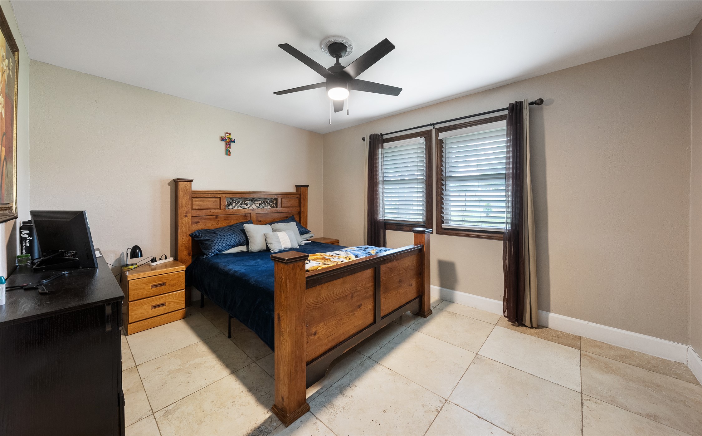 301 Oak Ridge Road Georgetown, TX 78628 - Photo 19 of 38 Spacious room featuring tile flooring, neutral wall tones, and a ceiling fan with integrated lighting
