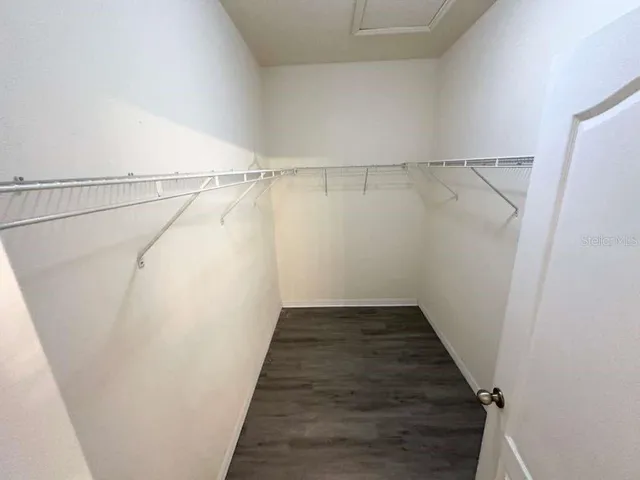 a view of a room with racks on the wall