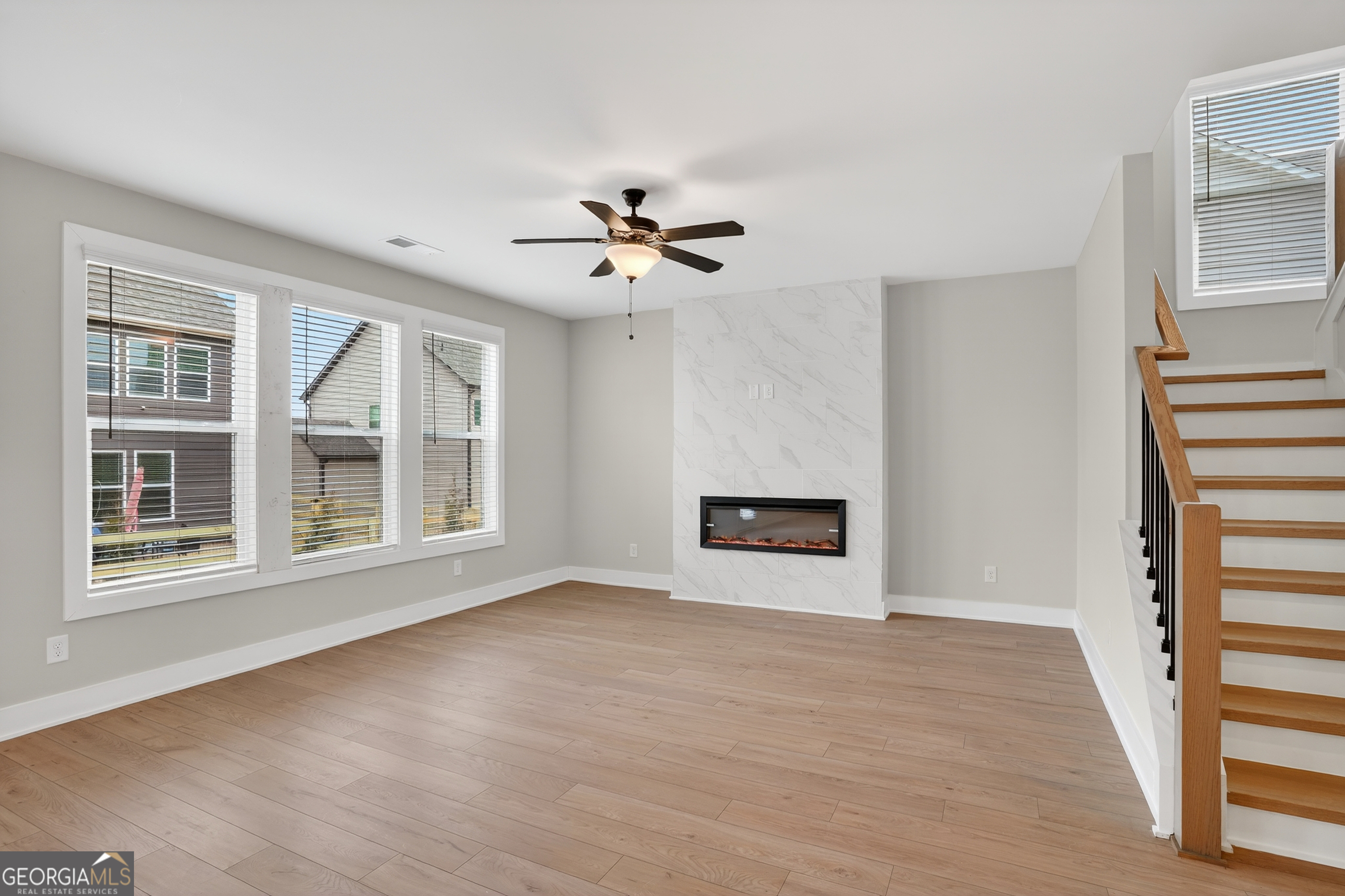 611 Villa Rica Springs Villa Rica, GA 30180 - Photo 12 of 35 a view of an empty room with a window and wooden floor
