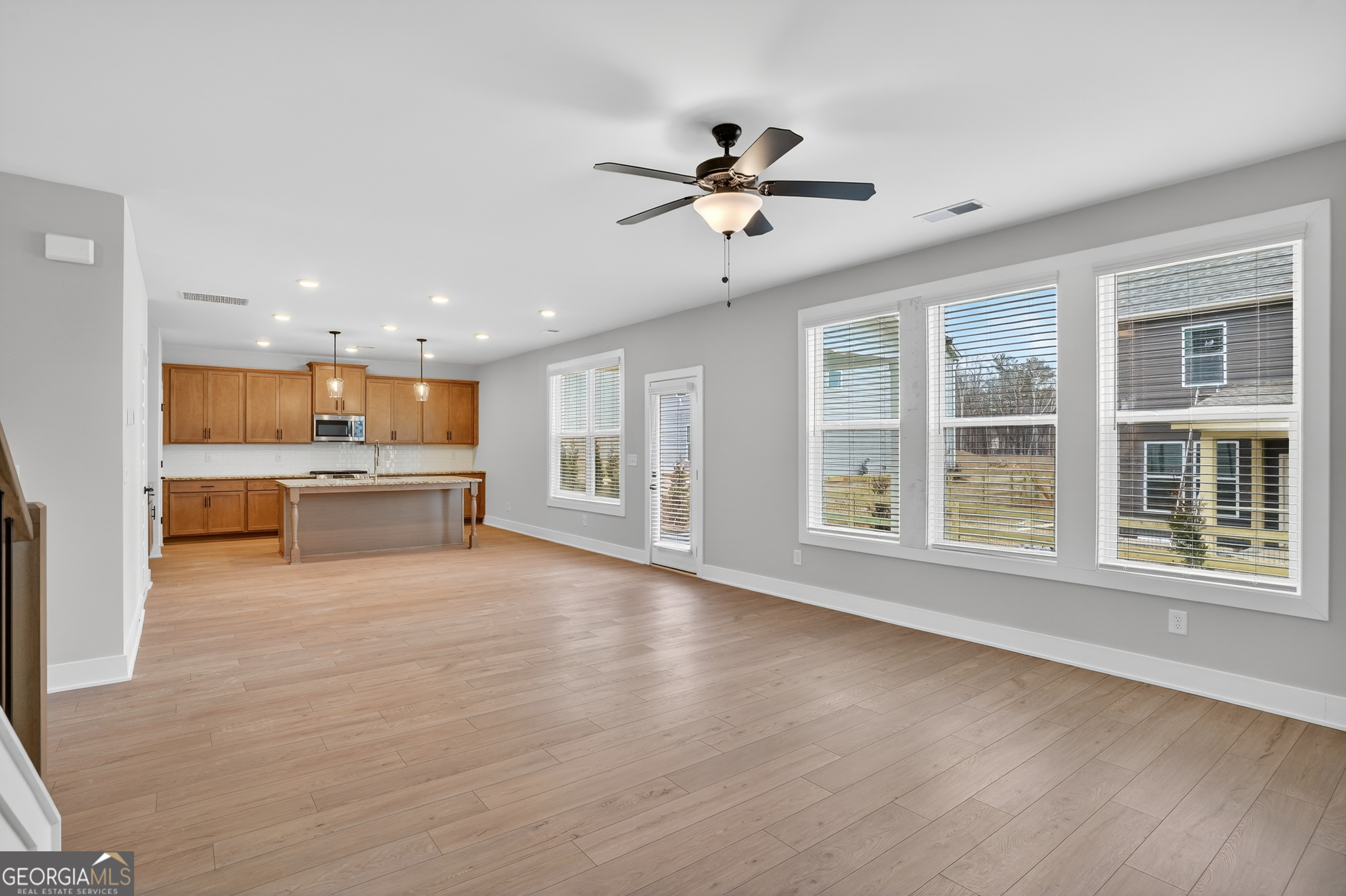 611 Villa Rica Springs Villa Rica, GA 30180 - Photo 13 of 35 a view of an empty room with a window and kitchen view