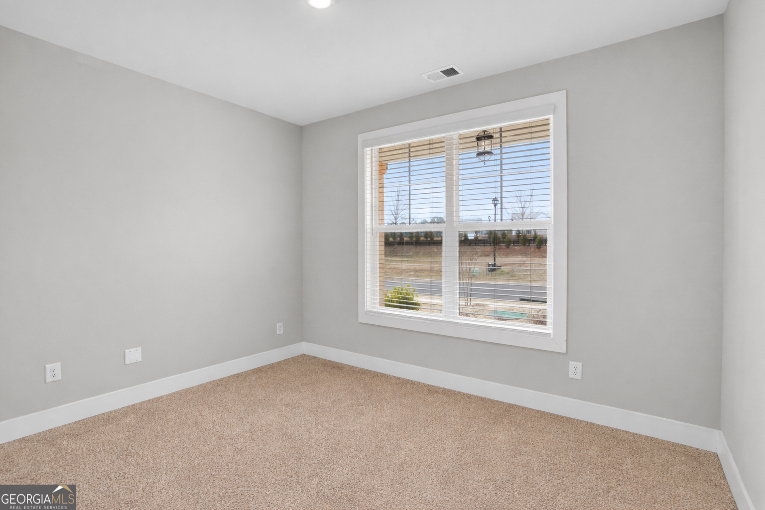 611 Villa Rica Springs Villa Rica, GA 30180 - Photo 15 of 35 an empty room with a window