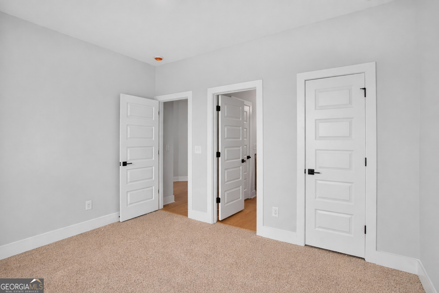 611 Villa Rica Springs Villa Rica, GA 30180 - Photo 16 of 35 wooden floor and closet in a room