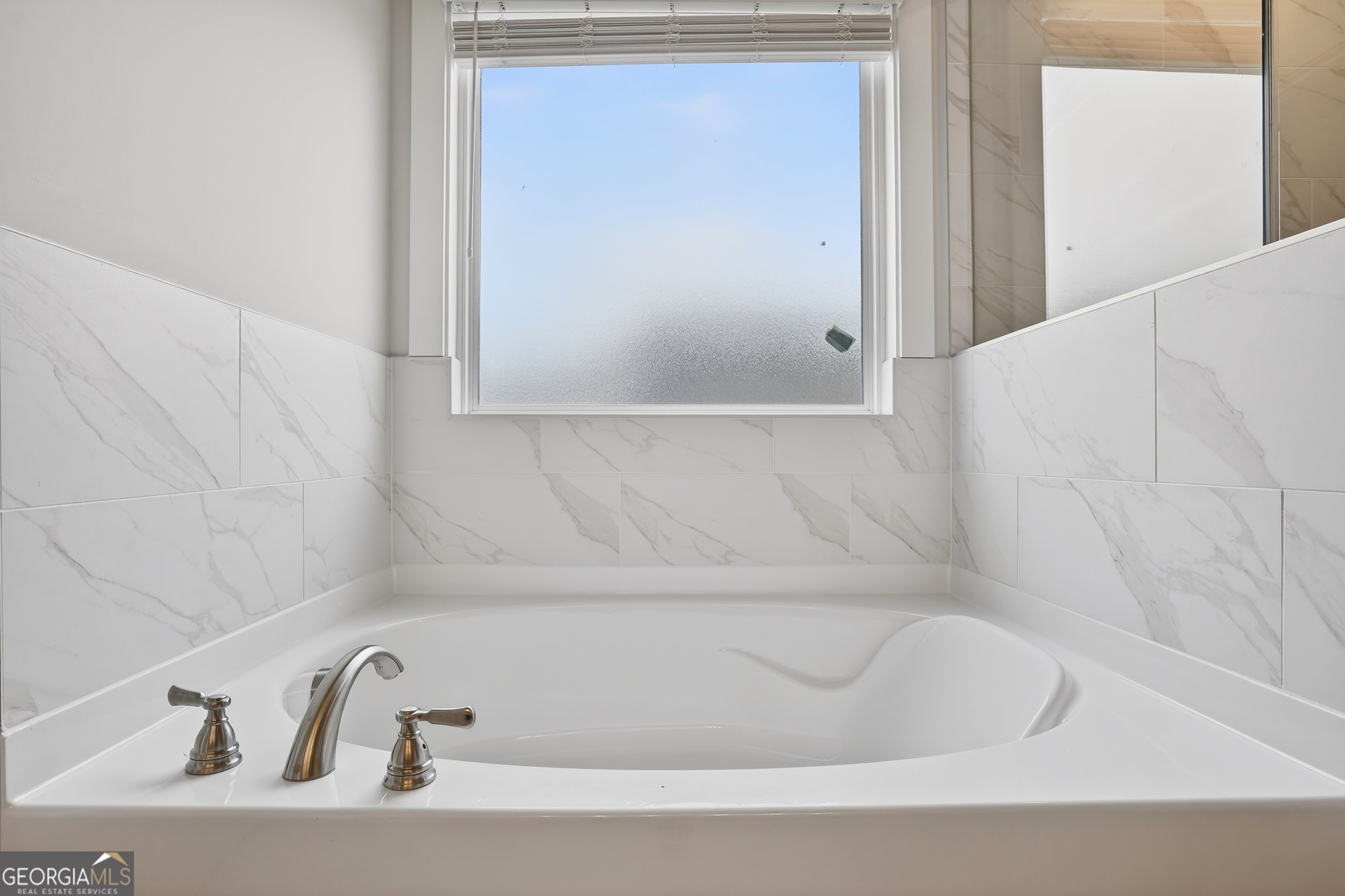 611 Villa Rica Springs Villa Rica, GA 30180 - Photo 26 of 35 a bathroom with a bathtub