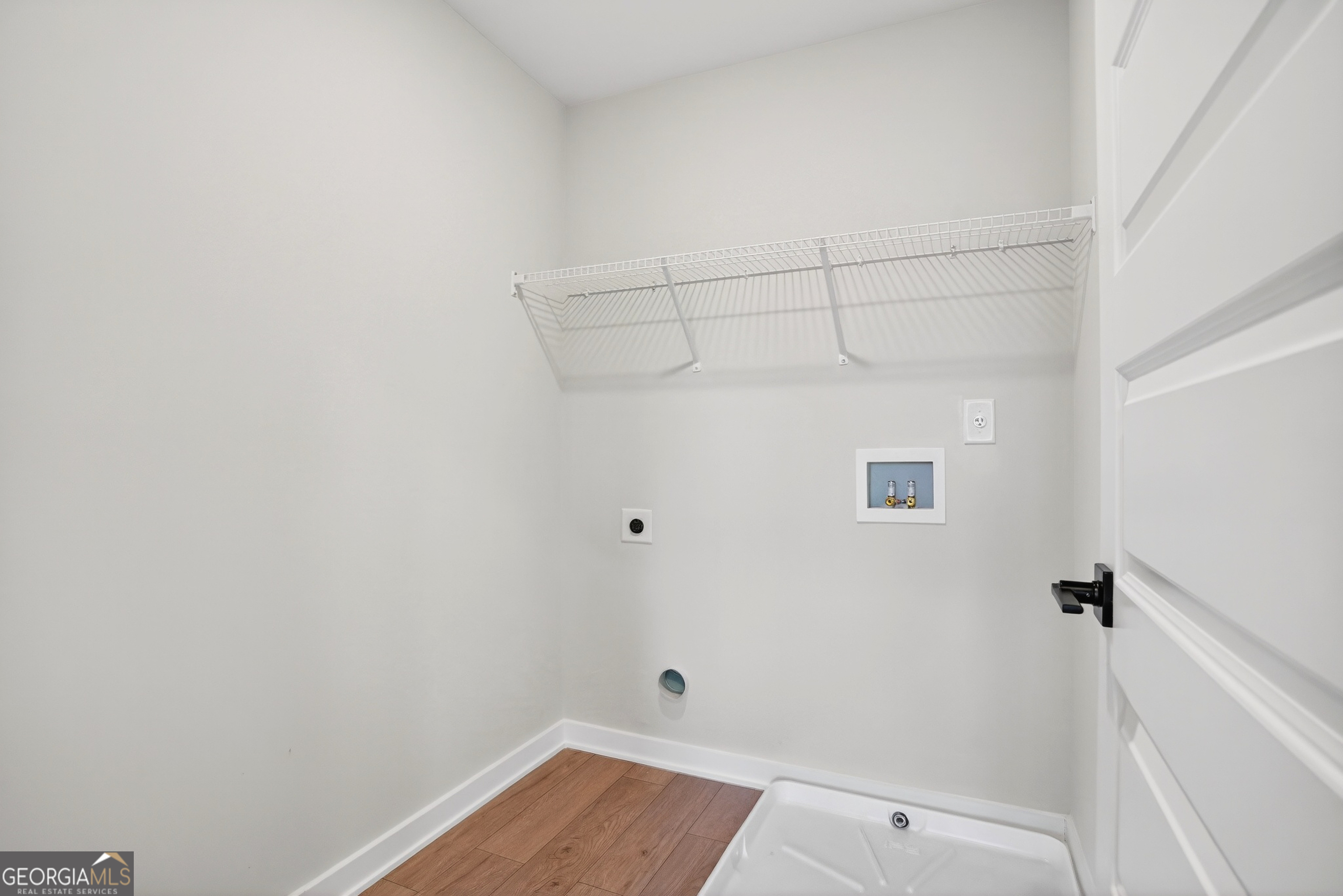 611 Villa Rica Springs Villa Rica, GA 30180 - Photo 29 of 35 a view of a room with racks on the wall