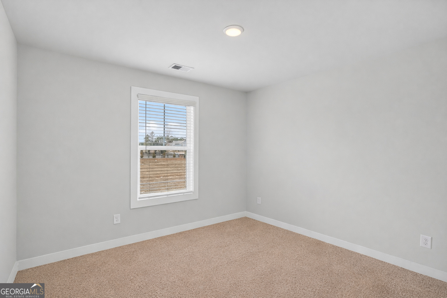 611 Villa Rica Springs Villa Rica, GA 30180 - Photo 30 of 35 an empty room with a window