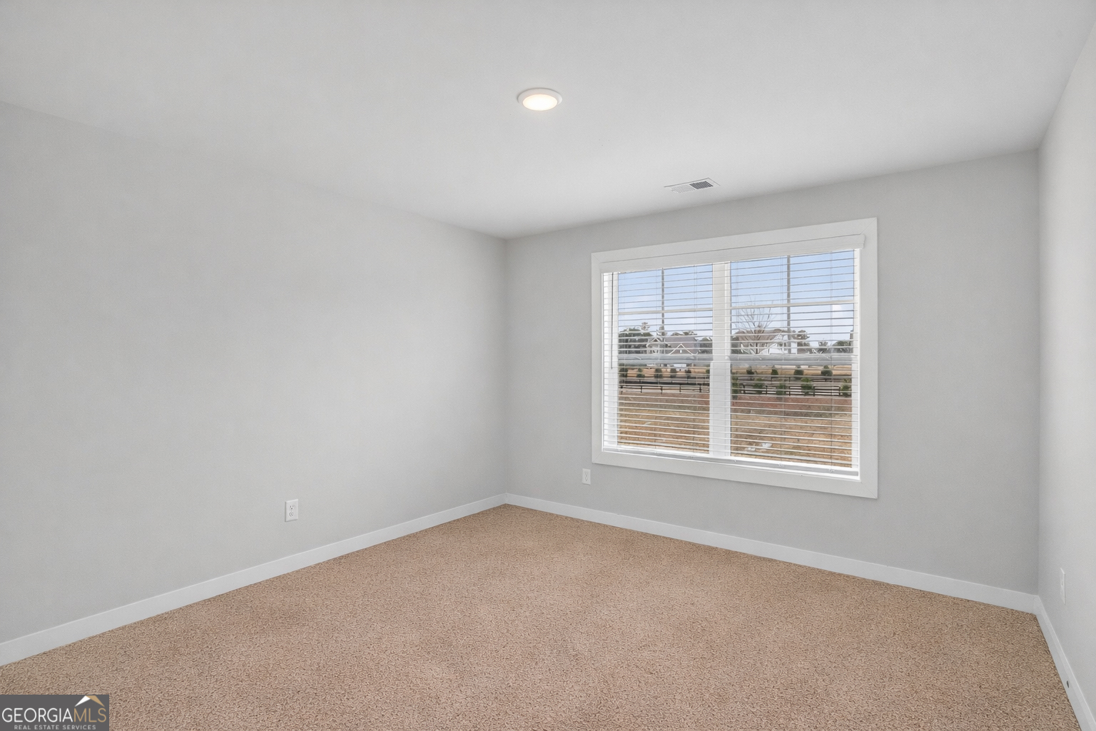 611 Villa Rica Springs Villa Rica, GA 30180 - Photo 32 of 35 an empty room with a window