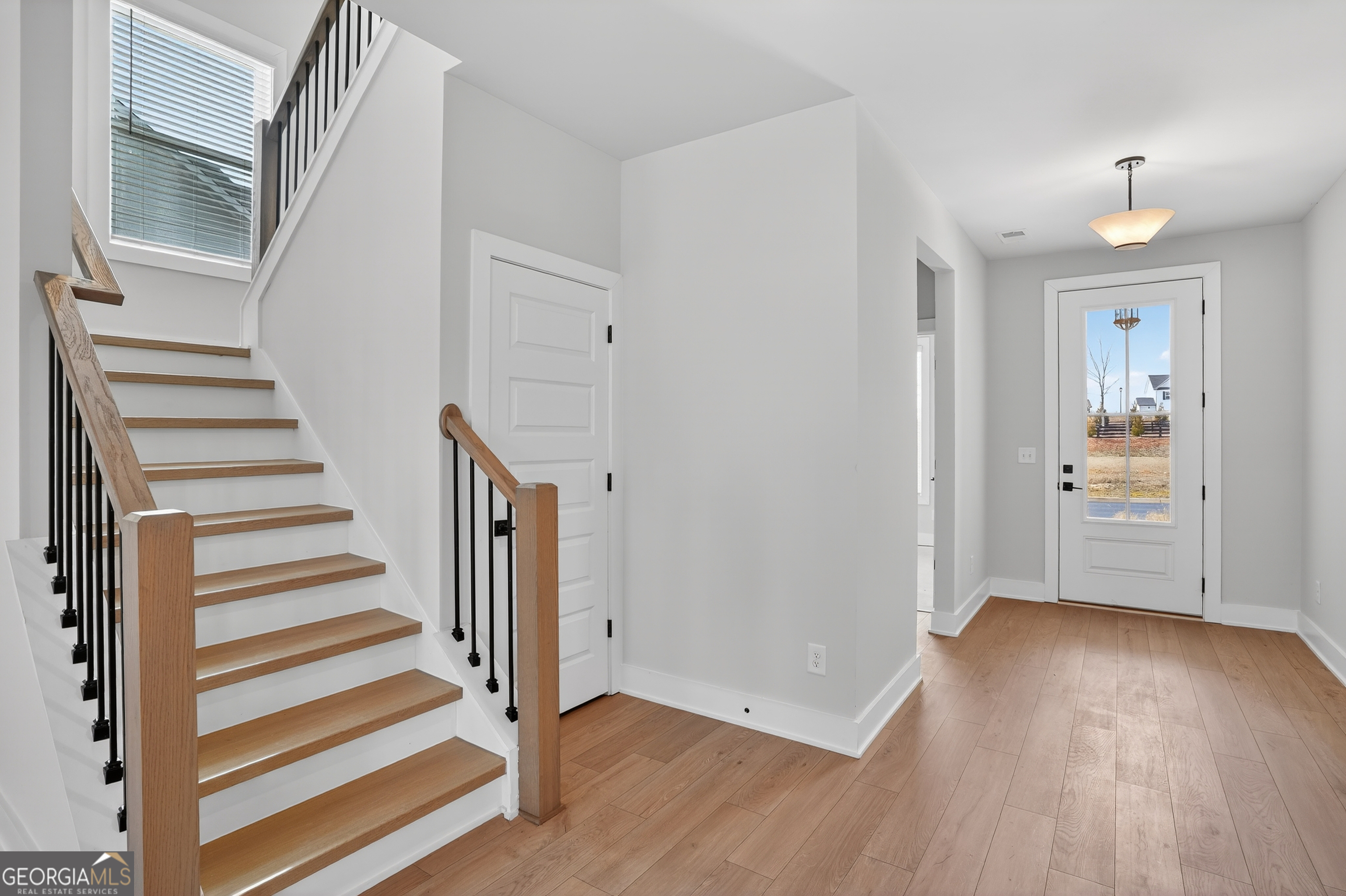 611 Villa Rica Springs Villa Rica, GA 30180 - Photo 4 of 35 a view of a hallway with wooden floor and entryway