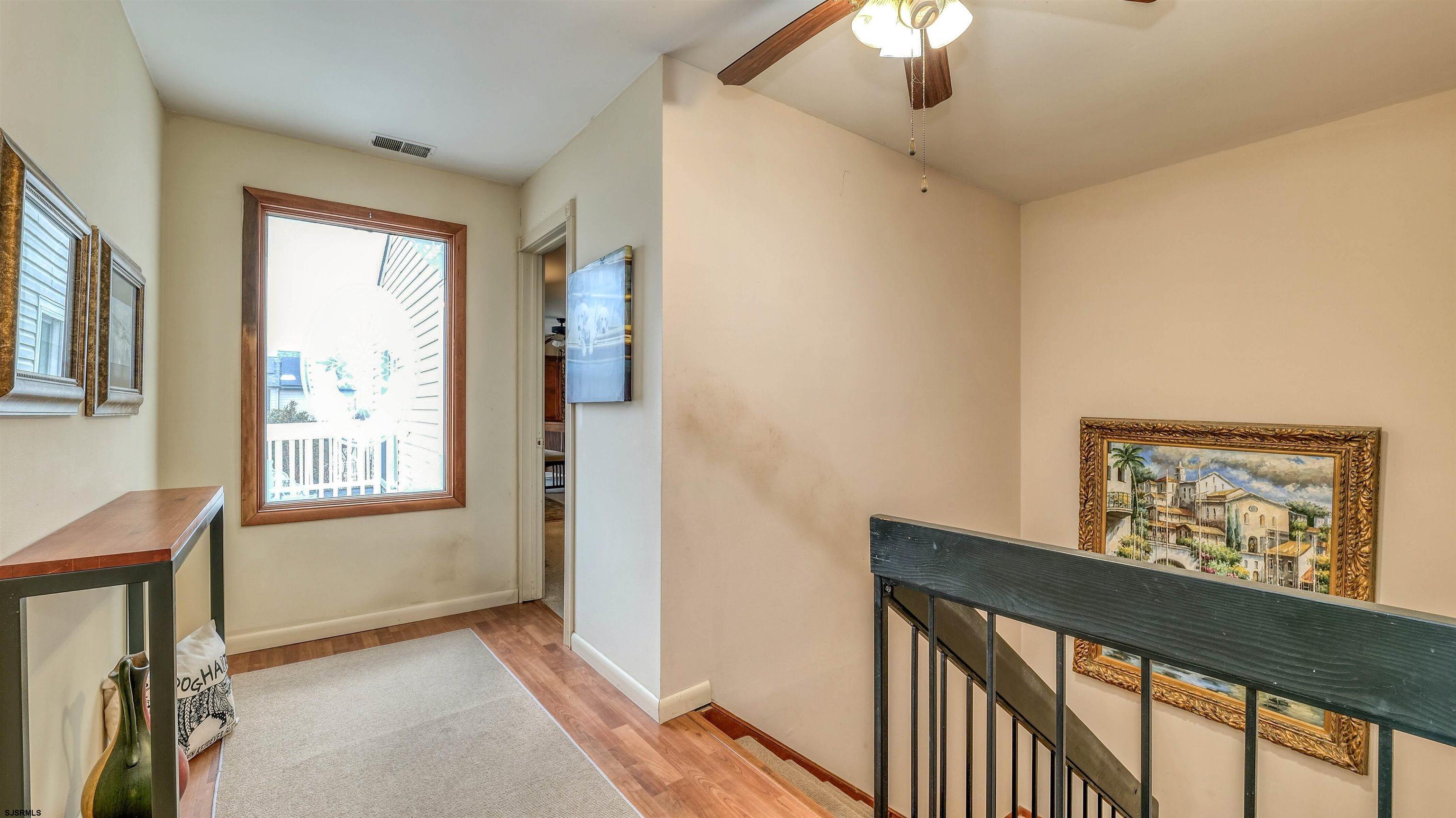 1330 Ouimet Road Brigantine, NJ 08203 - Photo 18 of 43 a view of an empty room with a window