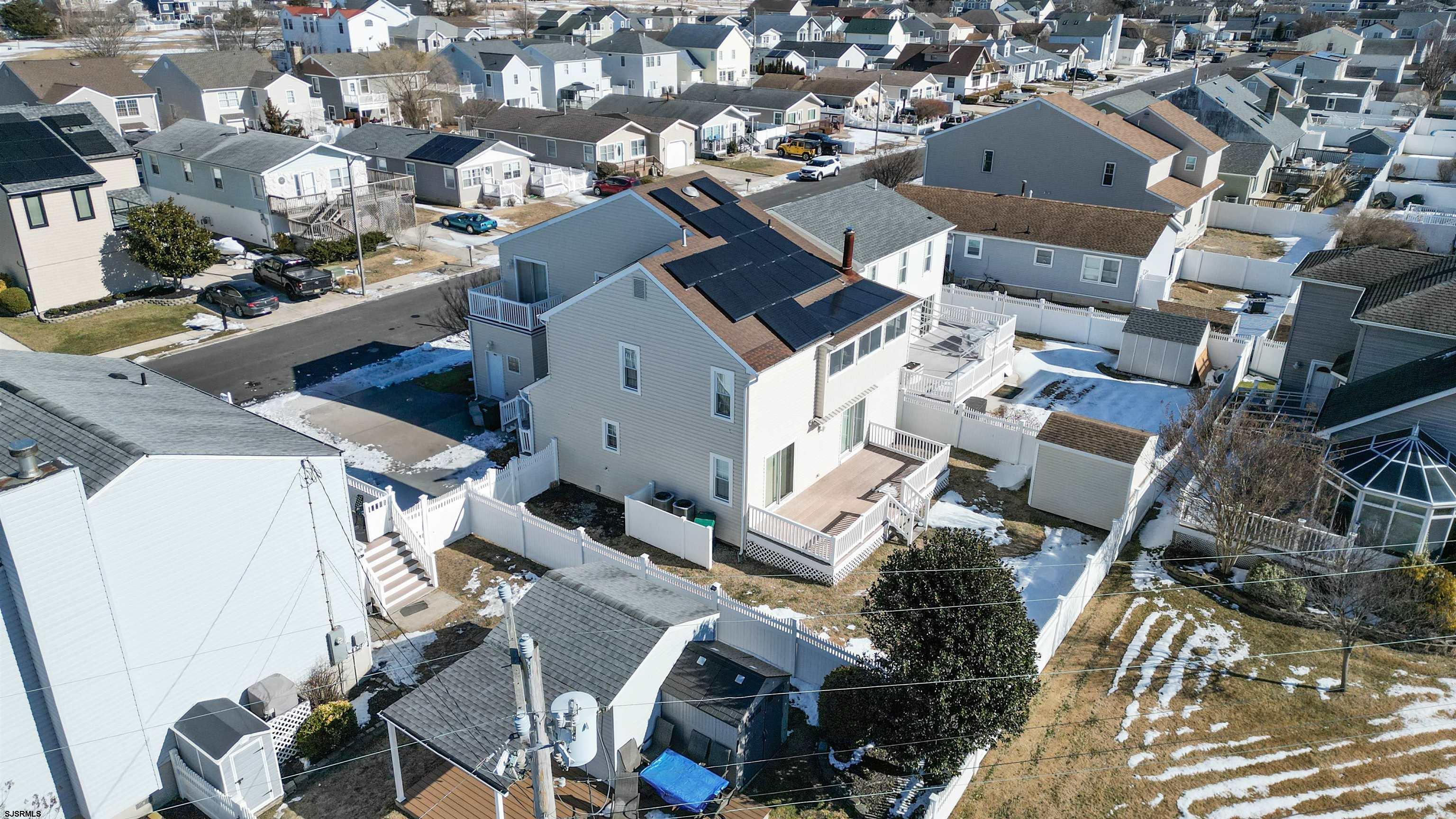 1330 Ouimet Road Brigantine, NJ 08203 - Photo 35 of 43 an aerial view of a house with parking space