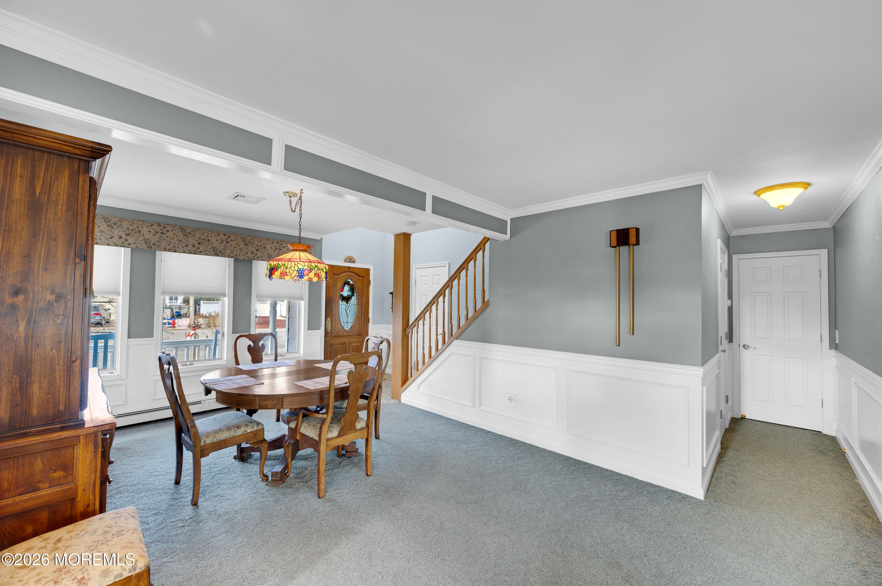 1005 Plimsoll Point Lanoka Harbor, NJ 08734 - Photo 14 of 54 a dining room with furniture and a floor to ceiling window