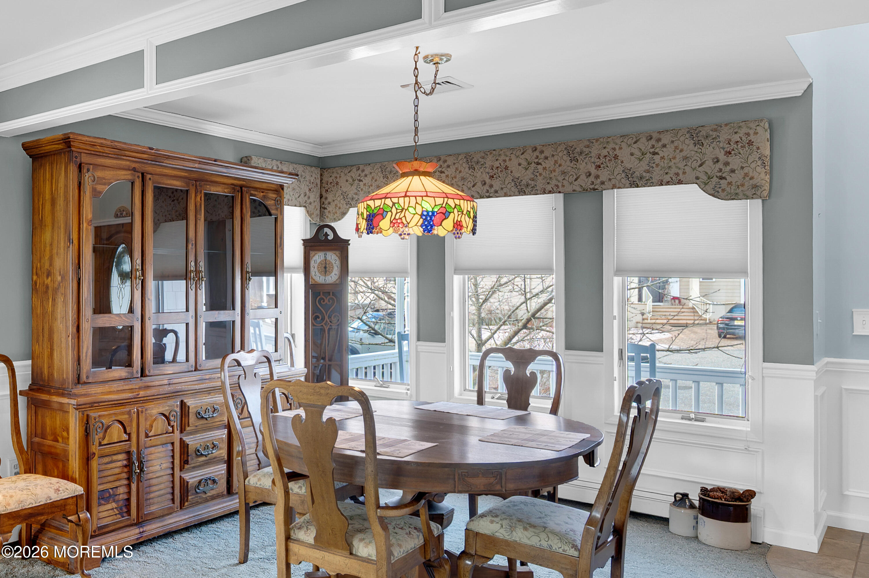 1005 Plimsoll Point Lanoka Harbor, NJ 08734 - Photo 16 of 54 a dining room with furniture a chandelier and wooden floor