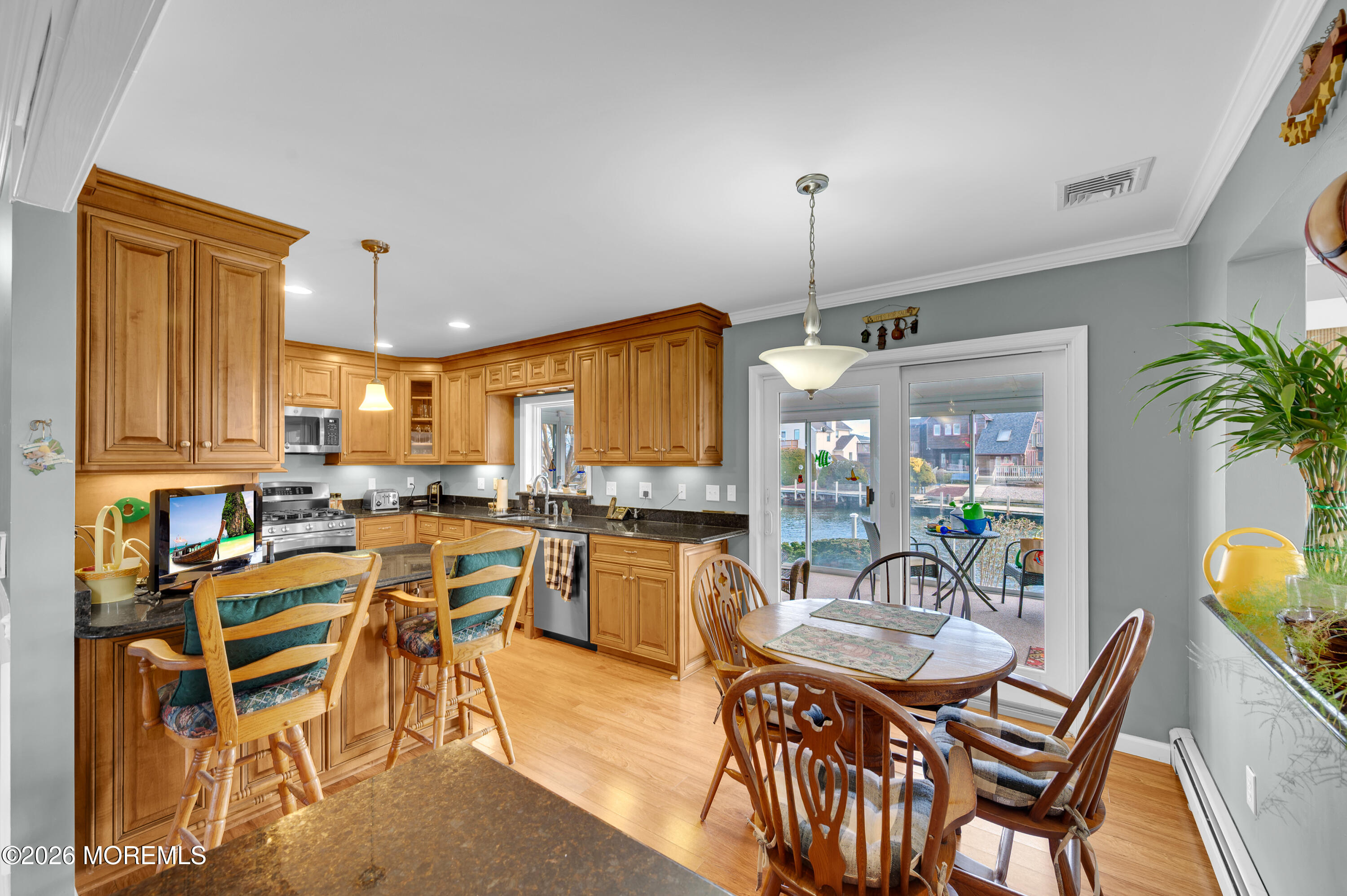 1005 Plimsoll Point Lanoka Harbor, NJ 08734 - Photo 23 of 54 a view of a dining room with furniture window and outside view