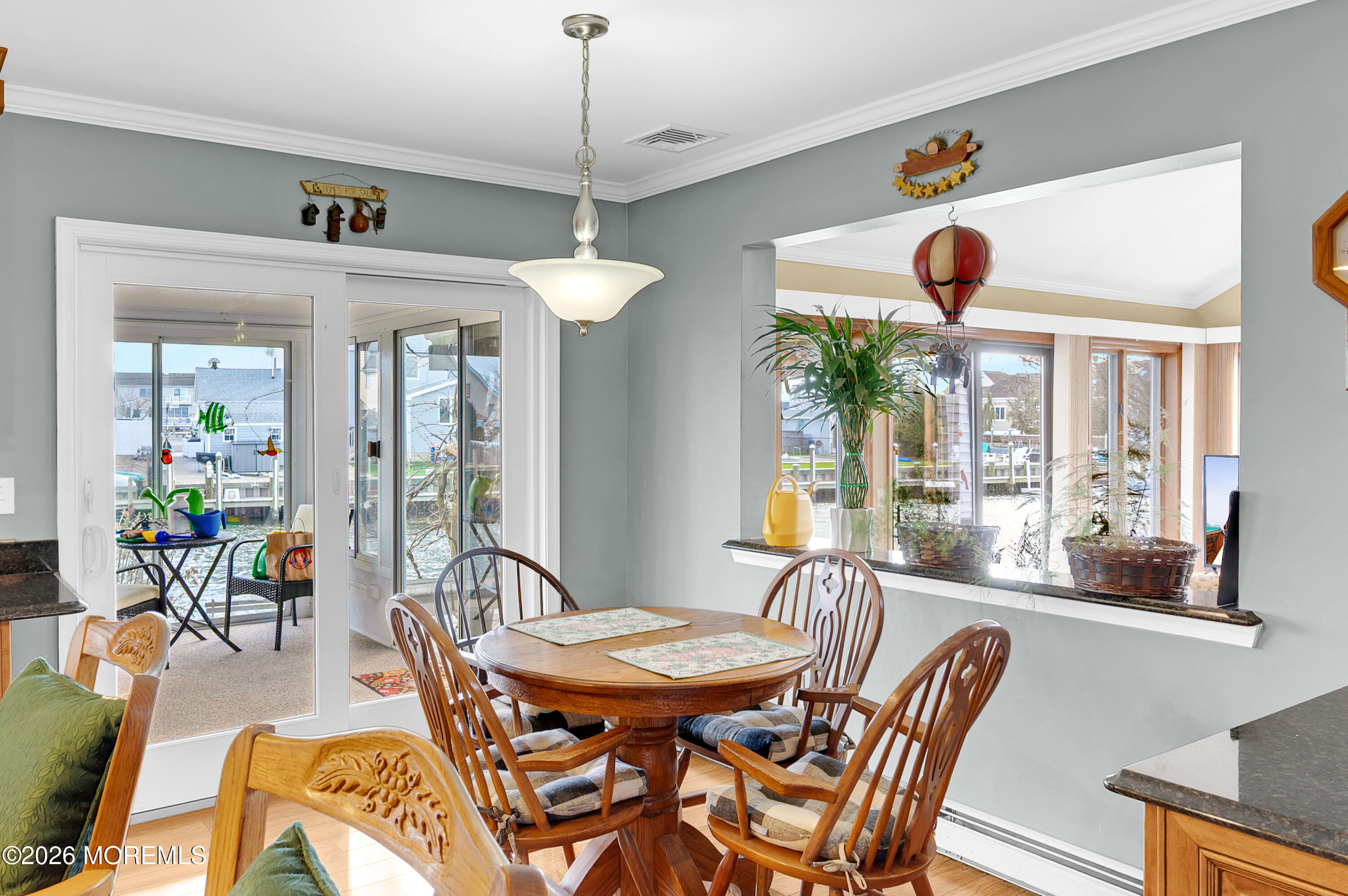 1005 Plimsoll Point Lanoka Harbor, NJ 08734 - Photo 29 of 54 a view of a dining room with furniture window and outside view