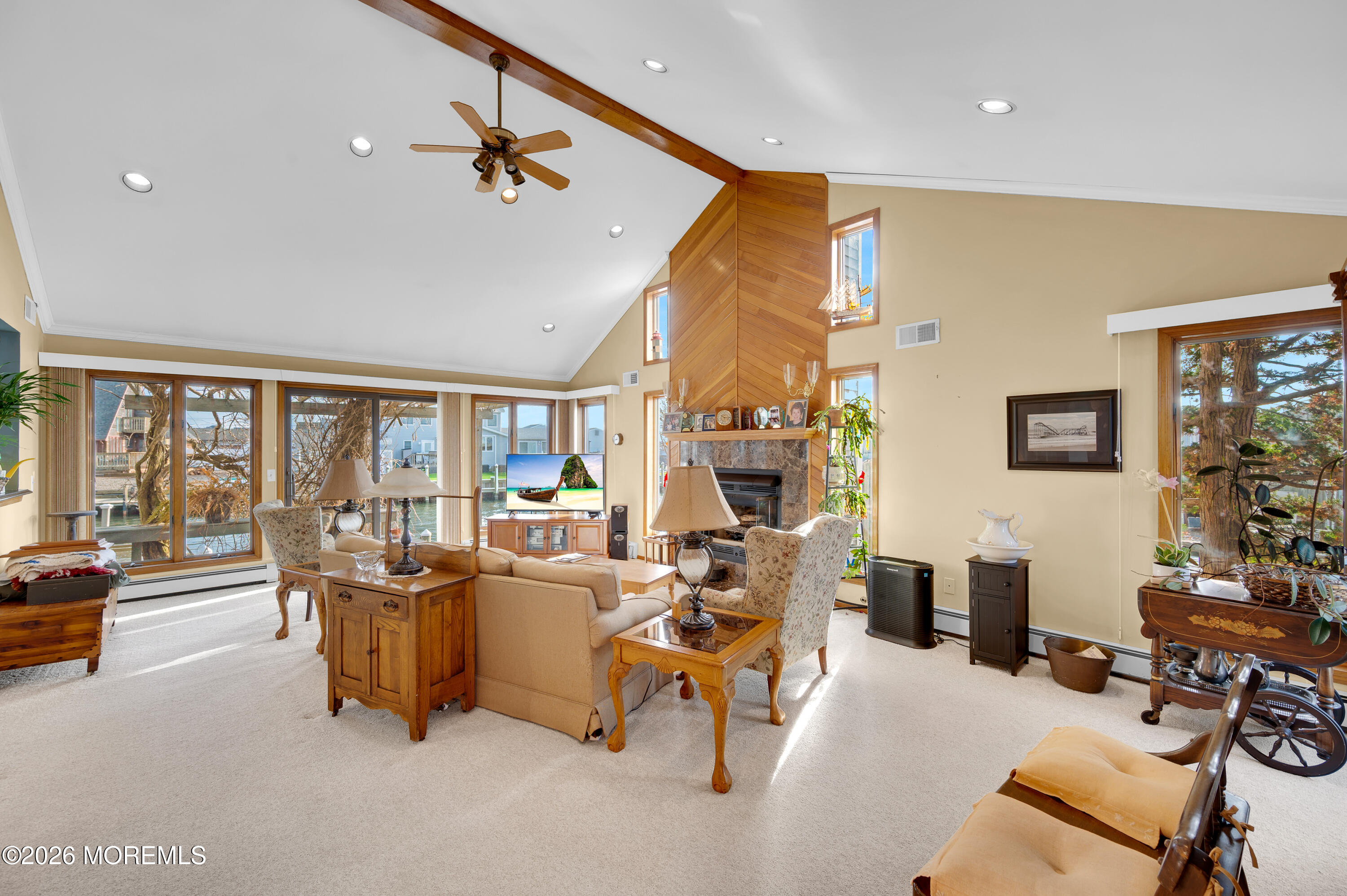 1005 Plimsoll Point Lanoka Harbor, NJ 08734 - Photo 36 of 54 a living room with furniture and a floor to ceiling window