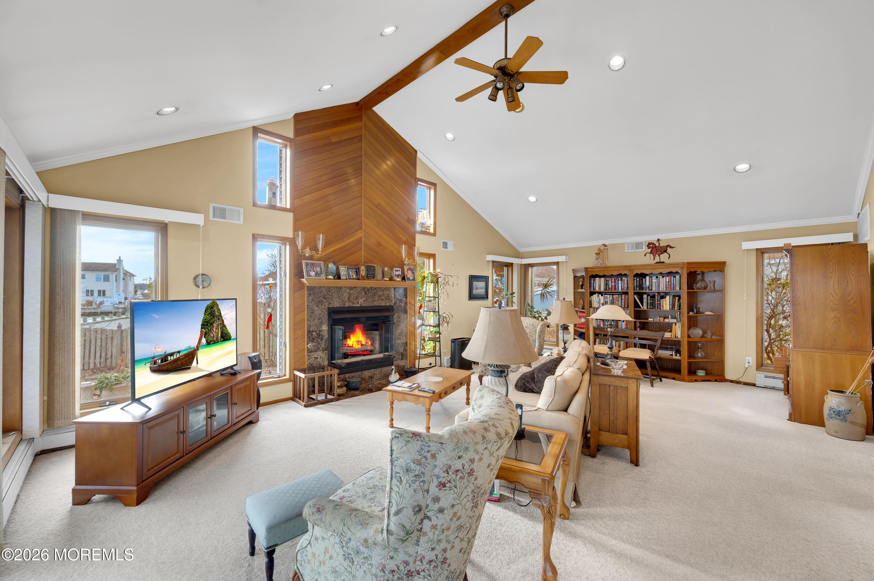 1005 Plimsoll Point Lanoka Harbor, NJ 08734 - Photo 38 of 54 a living room with furniture and a fireplace