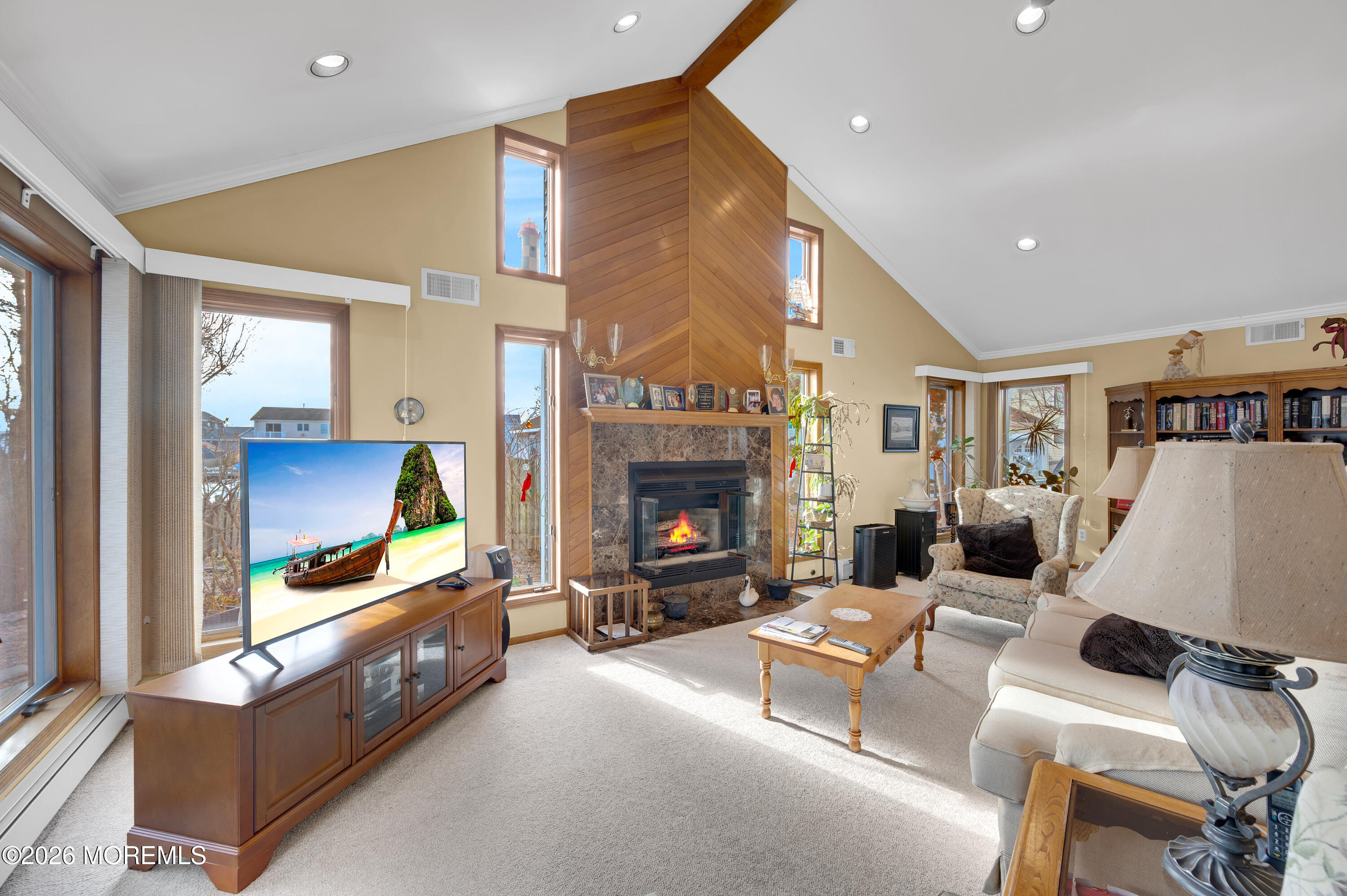 1005 Plimsoll Point Lanoka Harbor, NJ 08734 - Photo 39 of 54 a living room with furniture and a fireplace