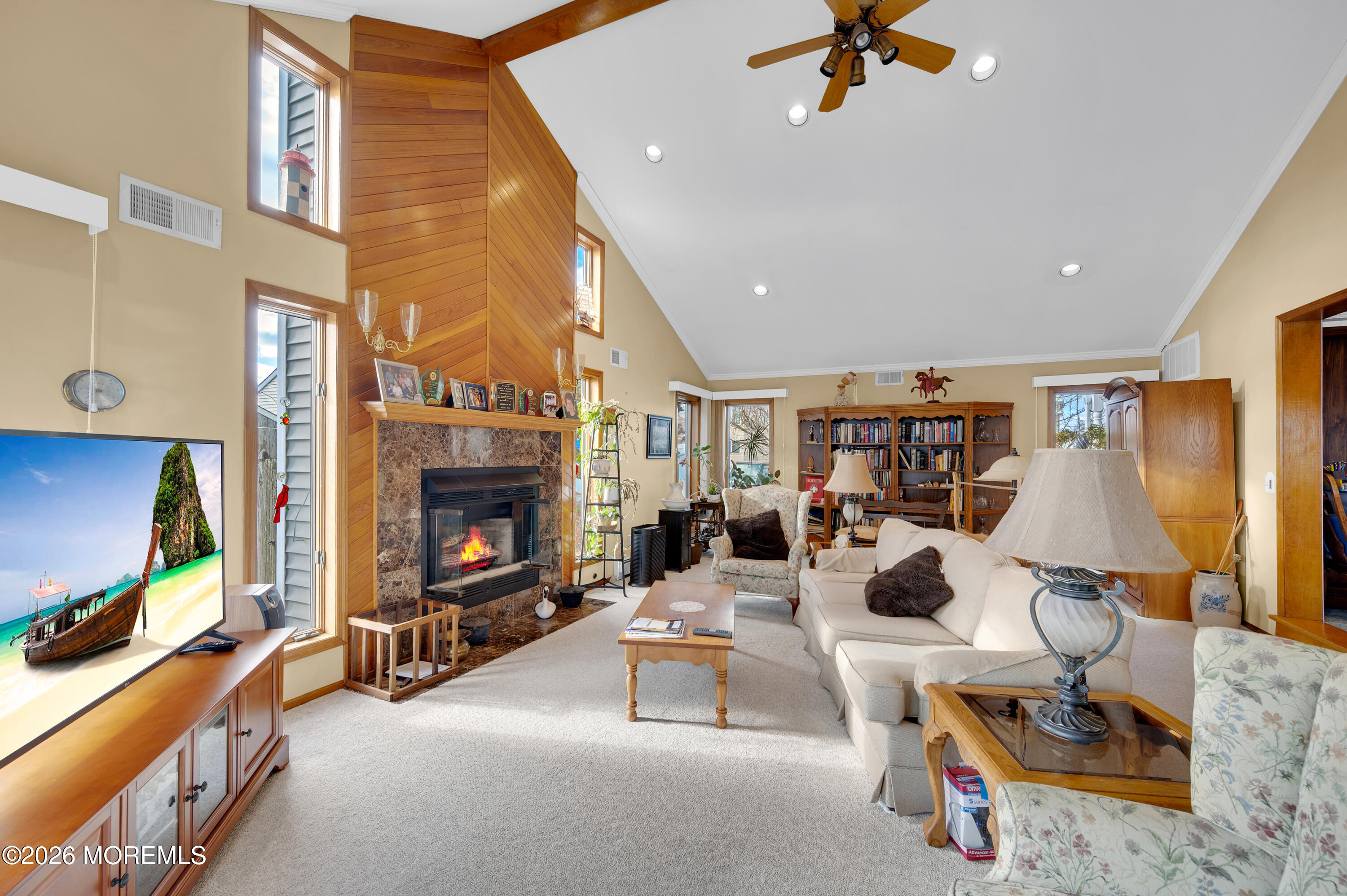 1005 Plimsoll Point Lanoka Harbor, NJ 08734 - Photo 41 of 54 a living room with furniture and a flat screen tv