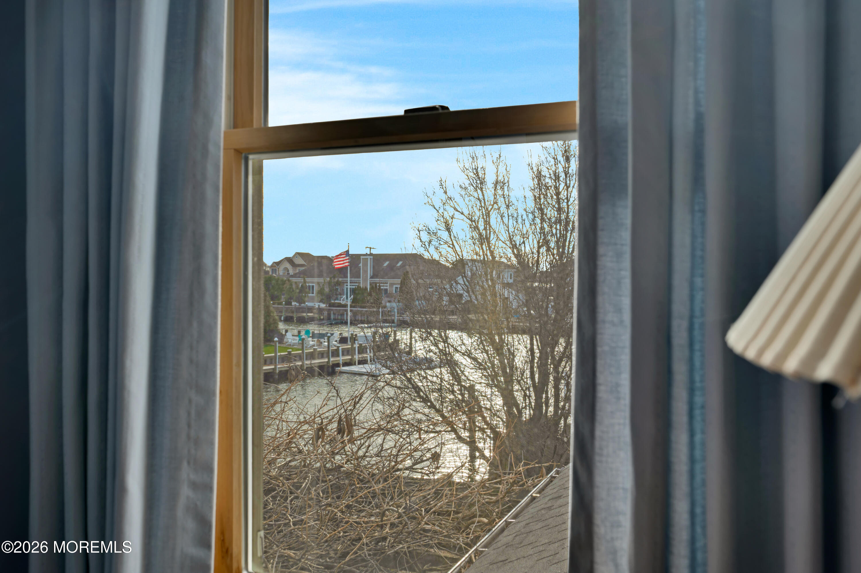 1005 Plimsoll Point Lanoka Harbor, NJ 08734 - Photo 46 of 54 a view of a glass door with a yard from a window