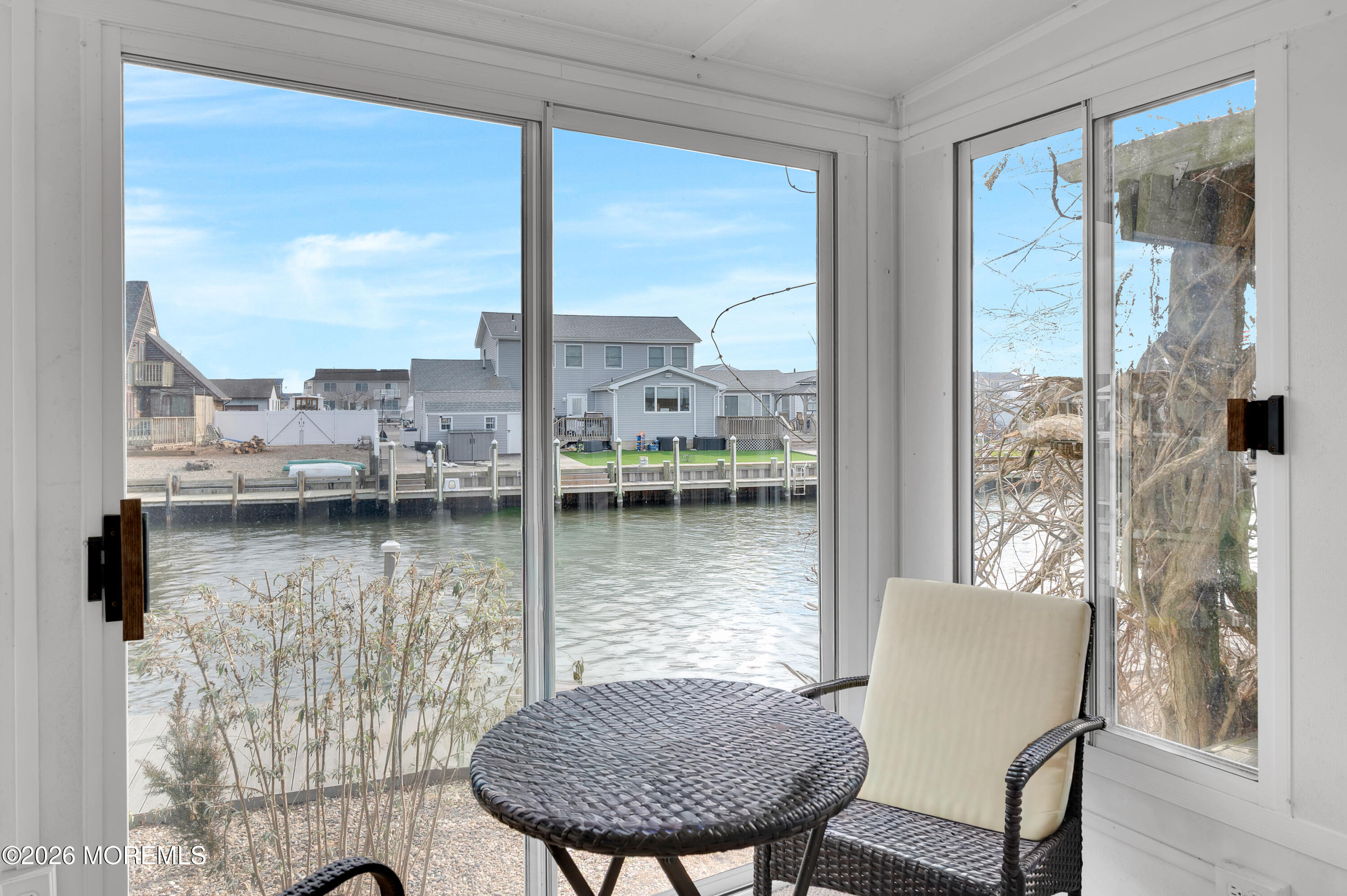 1005 Plimsoll Point Lanoka Harbor, NJ 08734 - Photo 50 of 54 a view of a balcony with table and chairs