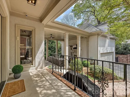 a view of a porch with seating space
